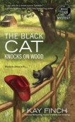 the black cat knocks